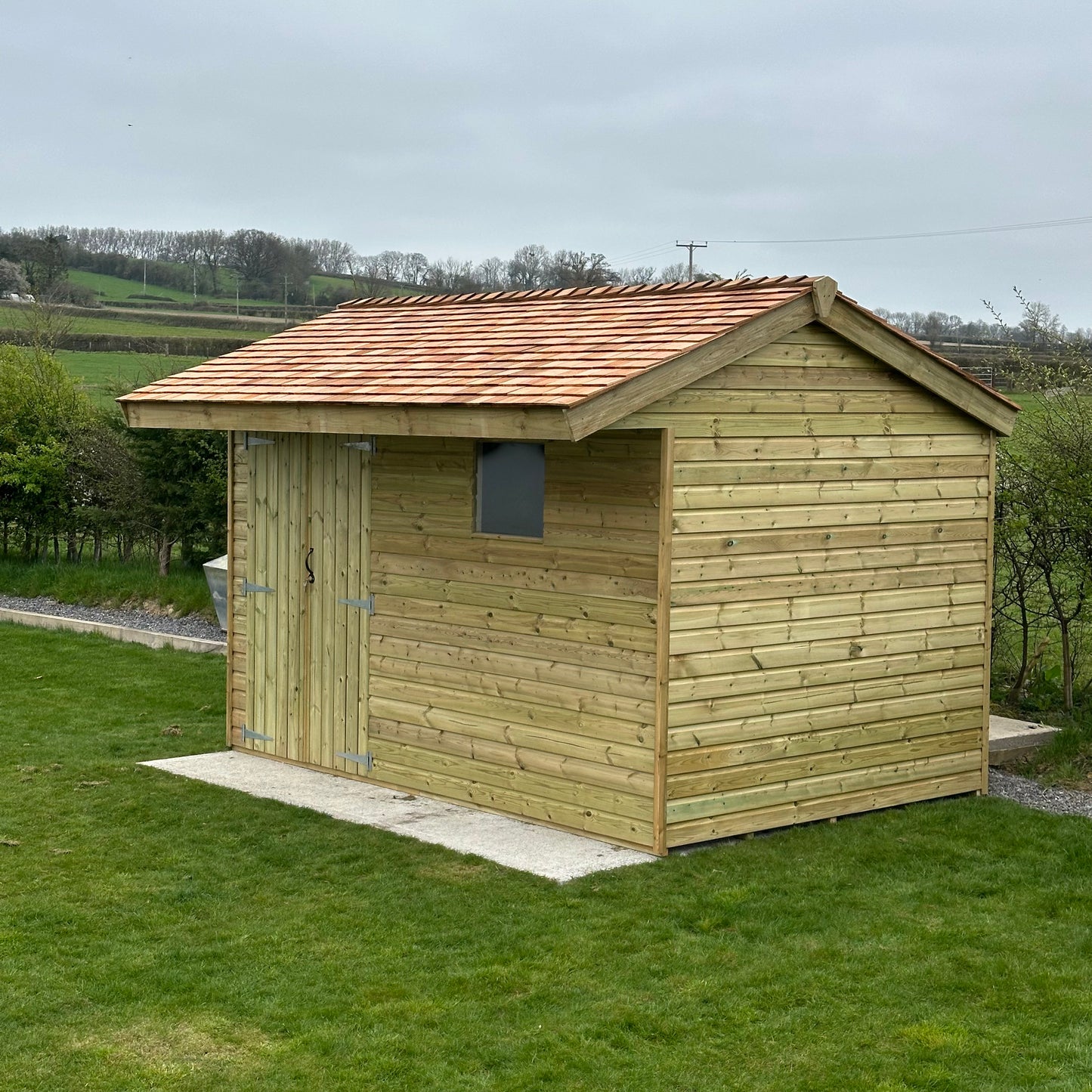 12x8 pent shed with a shingle roof and double doors
