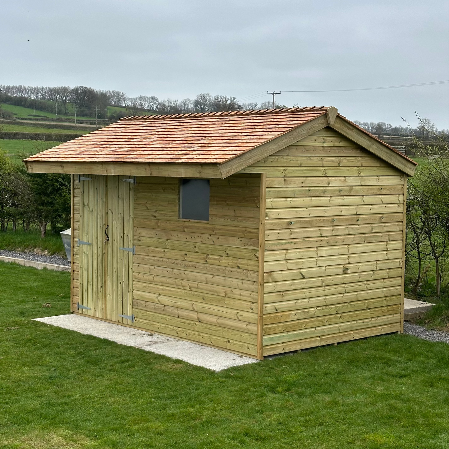 12x8 pent shed with a shingle roof and double doors